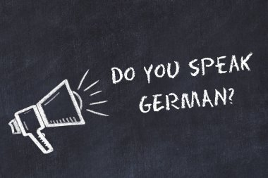 Öğrenme yabancı dil kavram. Tebeşir sembolü ifade ile hoparlörün Almanca konuşuyorsun