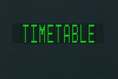 Yazıt takvimi ile LED panel ile koyu duvar dokusu