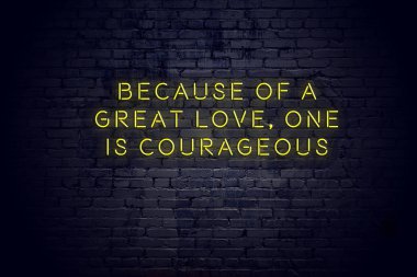 Tuğla duvara karşı olumlu bilge motivasyonel teklif ile Neon işareti 