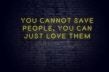 Tuğla duvara karşı olumlu bilge motivasyonel teklif ile Neon işareti 