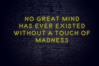 Tuğla duvara karşı olumlu bilge motivasyonel teklif ile Neon işareti 