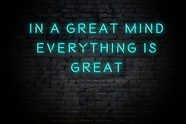 Tuğla duvara karşı olumlu akıllıca motivasyonel alıntı Neon yazıt 