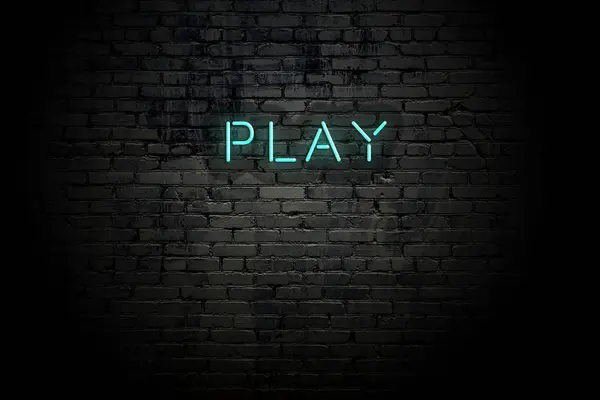 Kiemelt tégla fal neon felirattal játék — Stock Fotó