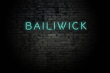 Neon yazıt bailiwick ile vurgulanmış tuğla duvar