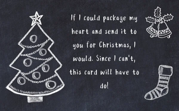 Drawing of christmas tree and handwritten greetings on black chalkboard — Stock Photo, Image