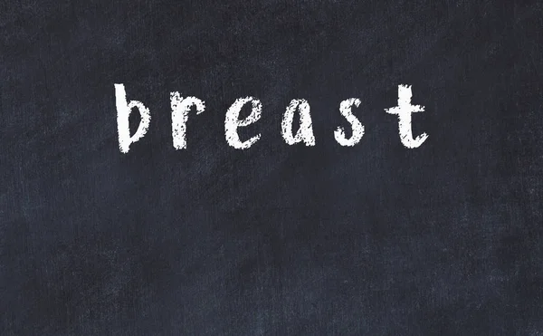 College chalk desk with the word breast written on in — Stock Photo, Image
