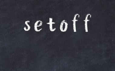 Üzerinde yazı setoff olan siyah karatahta