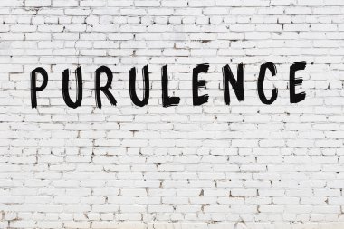 Beyaz tuğla duvara yazılmış bir kelime.