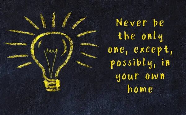 Chalk drawing of a bulb and inscription of wise quote — Stock Photo, Image