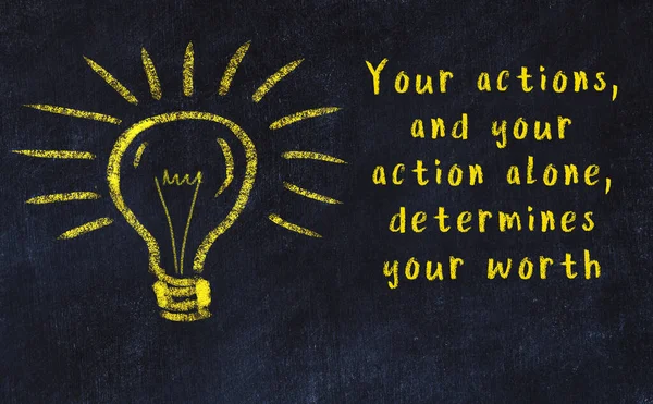 Chalk drawing of a bulb and inscription of wise quote — Stock Photo, Image