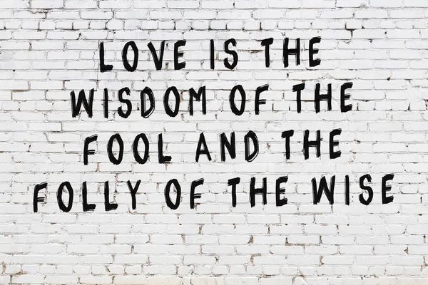 Painted black mindful inscription on white brick wall background — Stock Photo, Image