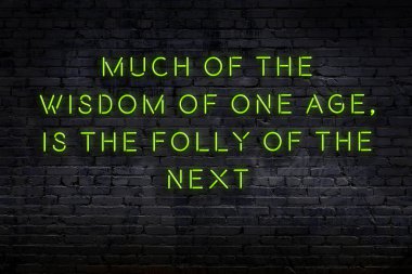 Zekice ve motive edici bir alıntı. Tuğla duvarda neon işareti