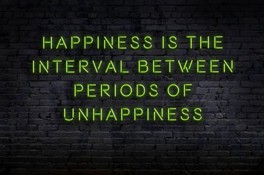 Zekice ve motive edici bir alıntı. Tuğla duvarda neon işareti