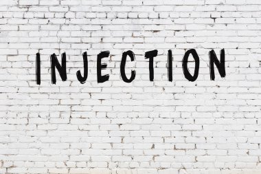 Beyaz tuğla duvara yazı enjeksiyonu