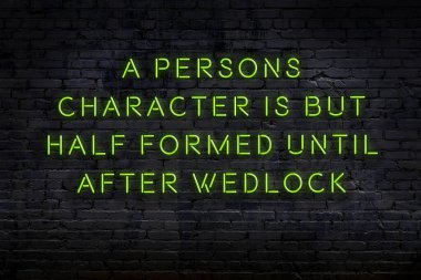 Zekice ve motive edici bir alıntı. Tuğla duvarda neon işareti