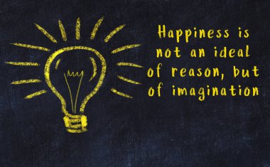 Bir ampulün tebeşir çizimi ve bilgece alıntıların yazımı