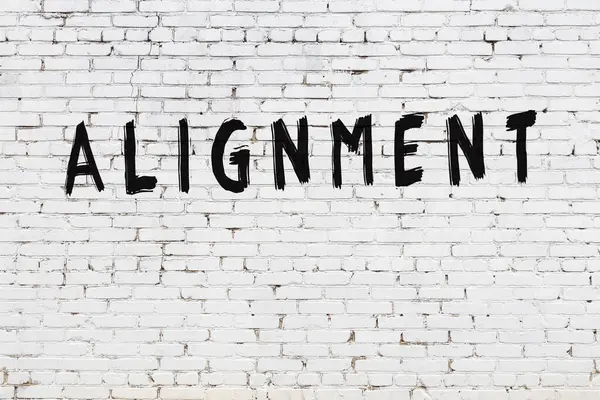 Beyaz tuğla duvara yazı dizimi