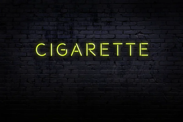 Neonové znamení. Slovo cigareta proti cihlové zdi. Noční pohled — Stock fotografie