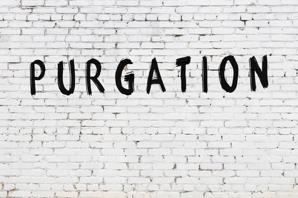 Üzerinde siyah boya arıtması olan beyaz duvar.