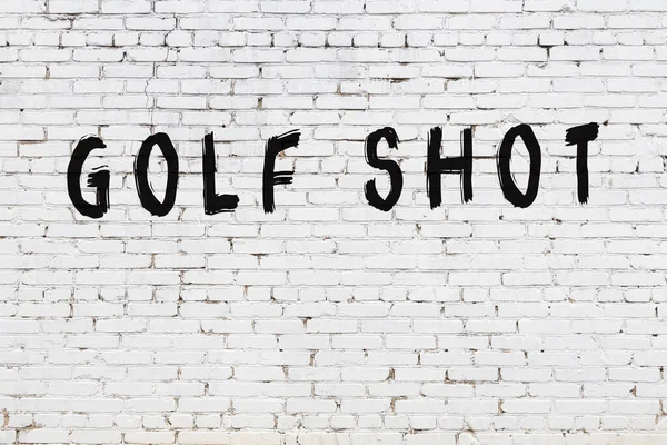 Inscrição tiro de golfe pintado na parede de tijolo branco — Fotografia de Stock