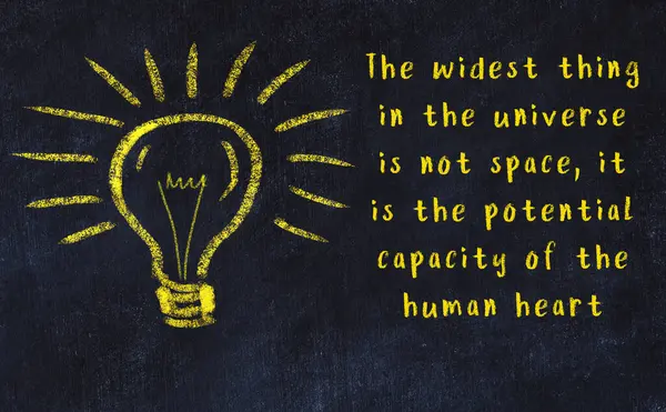 Chalk drawing of a bulb and inscription of wise quote — Stock Photo, Image