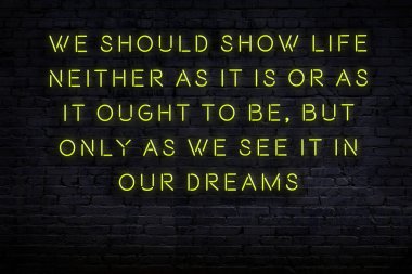 Zekice ve motive edici bir alıntı. Tuğla duvarda neon işareti