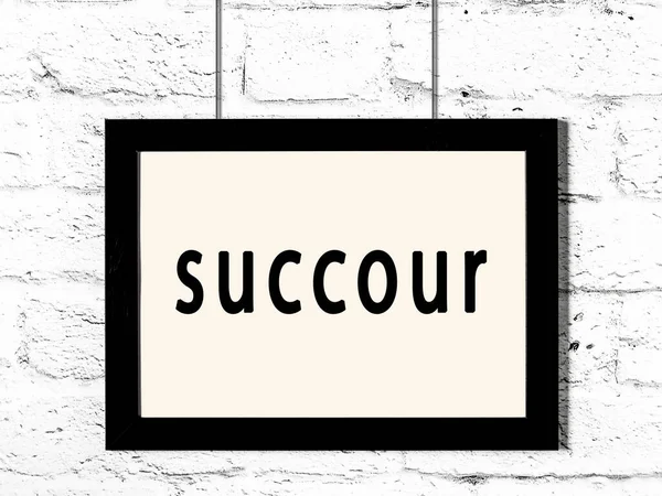 Quadro preto pendurado na parede de tijolo branco com succour inscrição — Fotografia de Stock