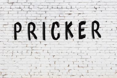 Üzerinde siyah boya dikenli beyaz duvar.