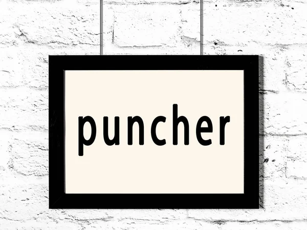 Quadro preto pendurado na parede de tijolo branco com puncher inscrição — Fotografia de Stock