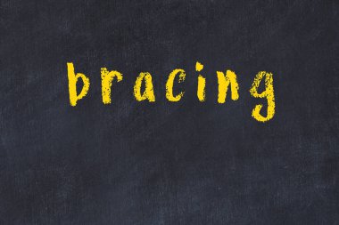 Üzerinde yazı olan siyah karatahta