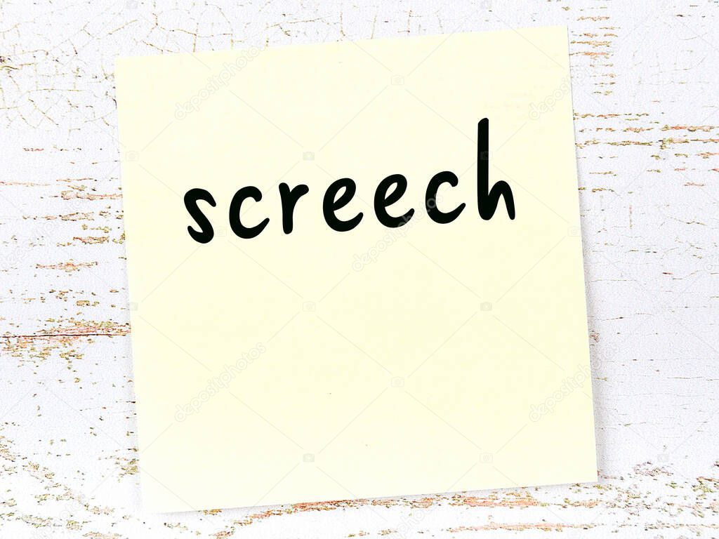 Yellow sheet of paper with word screech. Reminder concept