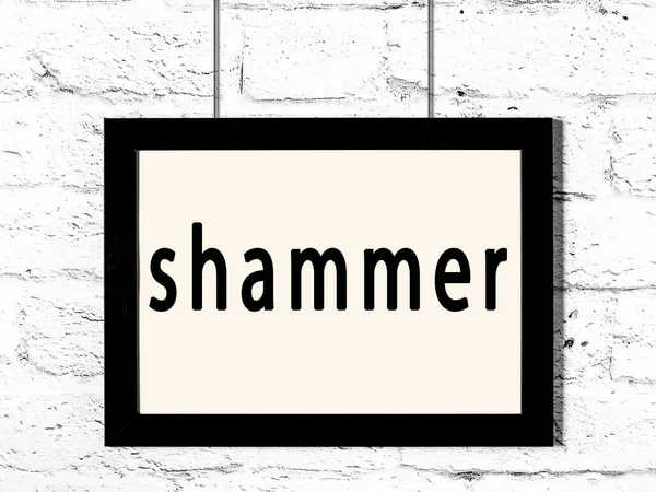 Quadro preto pendurado na parede de tijolo branco com shammer inscrição — Fotografia de Stock
