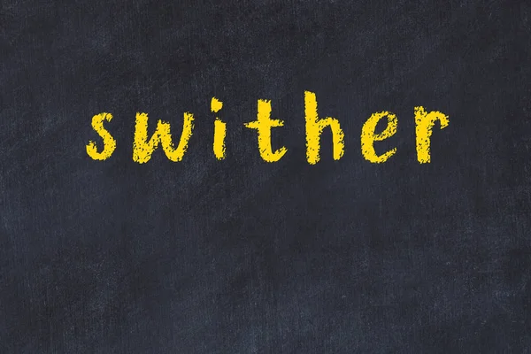 College chalk desk with the word swither written on in — Stock Photo, Image