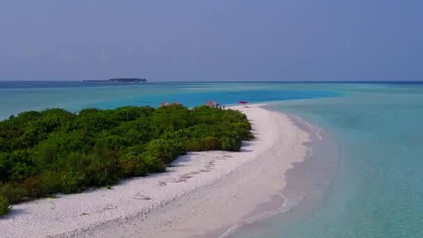 Aerial scenery of tropical tourist beach adventure by blue water and white sandy background — Stock Video