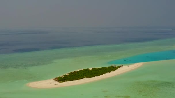 Aerial scenery of tropical tourist beach lifestyle by blue ocean with white sand background — Stock Video