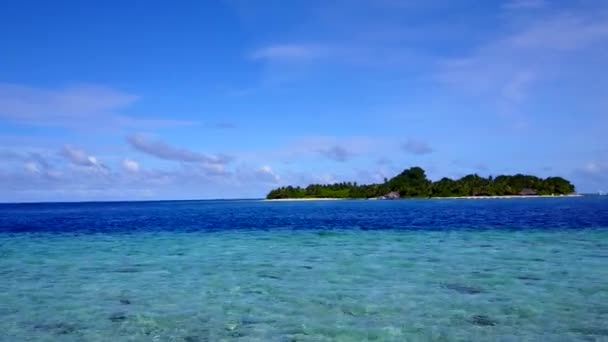 Aerial view scenery of tropical island beach trip by blue green sea with white sandy background — Stock Video