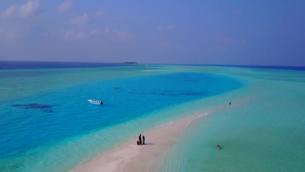 Aerial view landscape of idyllic lagoon beach break by turquoise ocean with white sandy background — Stock Video