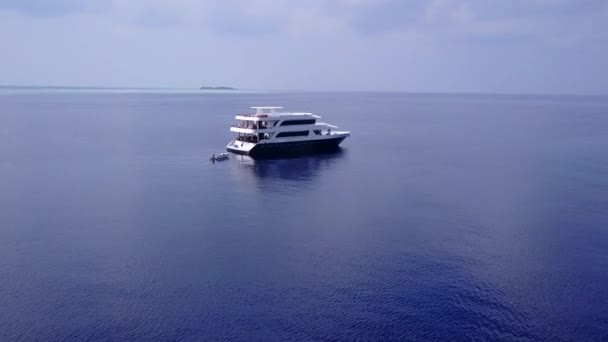 Aerial drone travel of idyllic bay beach adventure by blue lagoon with clean sandy background — Stock Video