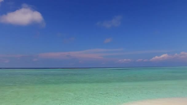 Romantic nature of tropical coast beach wildlife by blue sea with white sandy background after sunrise — Stock Video