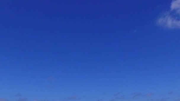 Sunny seascape of beautiful coast beach break by shallow water with clean sand background near waves — Stock Video