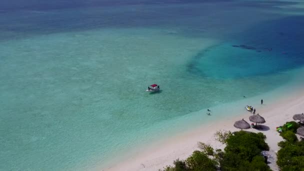 Sunny seascape of exotic seashore beach journey by blue water with white sandy background in sunlight — Stock Video