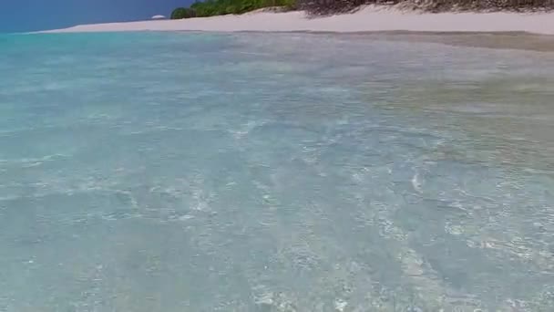 Warm landscape of idyllic coast beach trip by aqua blue lagoon with white sand background near sandbank — Stock Video