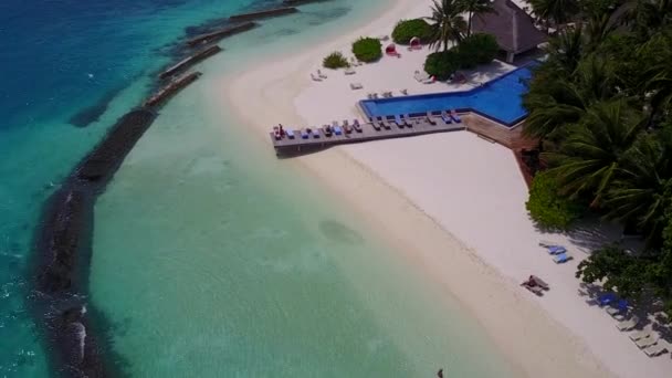 Warm scenery of idyllic seashore beach break by clear water with white sandy background near surf — Stock Video