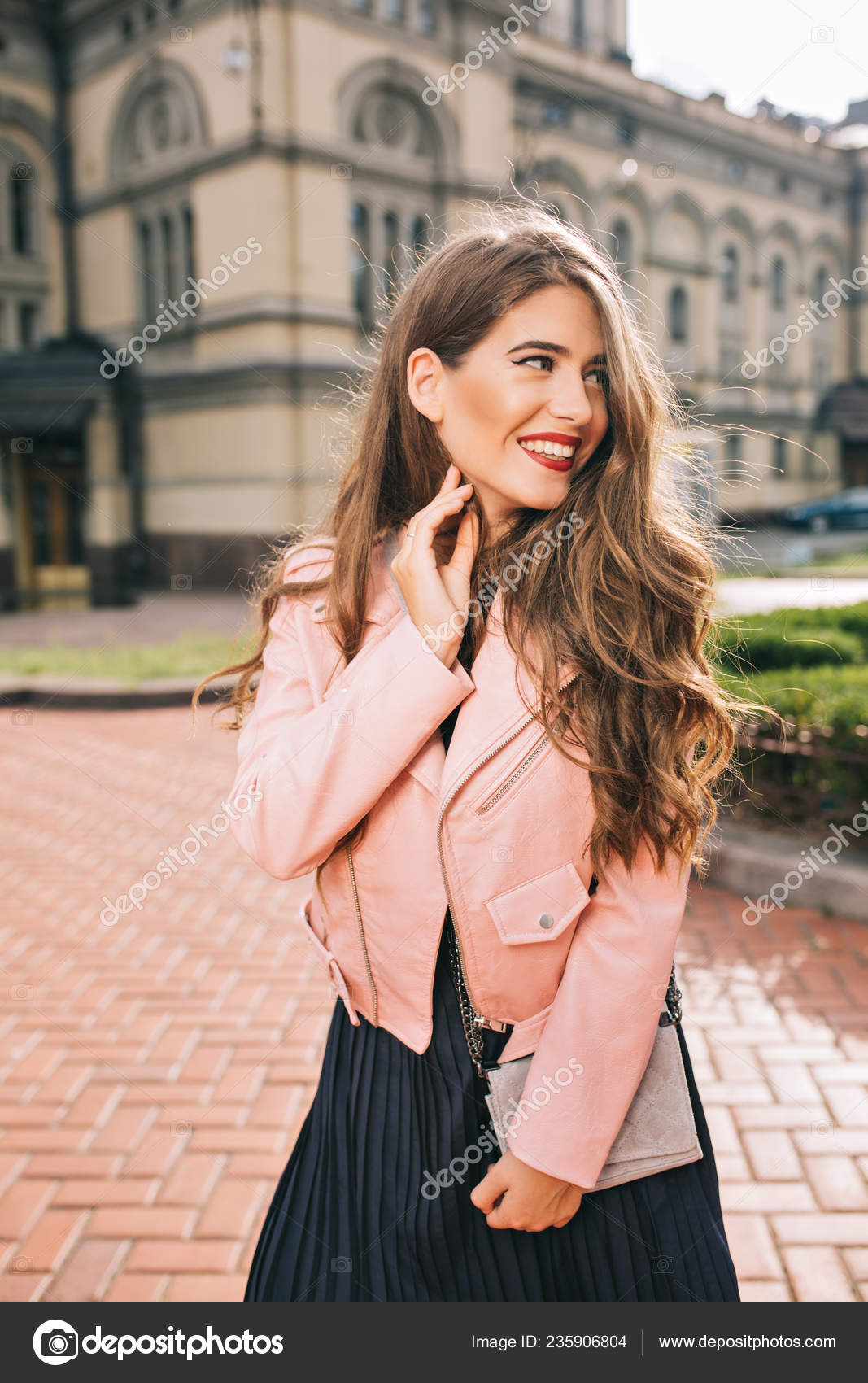black dress pink jacket
