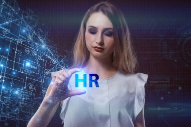 İş, teknoloji, Internet ve ağ kavramı. Geleceğin sanal bir ekranda çalışan genç bir girişimci ve yazıt görür: Hr