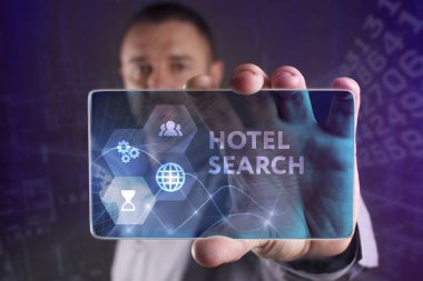 İş, teknoloji, Internet ve ağ kavramı. Geleceğin sanal bir ekranda çalışan genç bir girişimci ve yazıt görür: otel arama