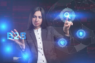 İş, teknoloji, Internet ve ağ kavramı. Geleceğin sanal bir ekranda çalışan genç bir girişimci ve yazıt görürse: B2b