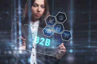 İş, teknoloji, Internet ve ağ kavramı. Geleceğin sanal bir ekranda çalışan genç bir girişimci ve yazıt görürse: B2b