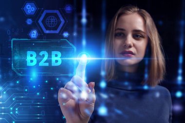 İş, Teknoloji, İnternet ve ağ konsepti. Genç işadamı geleceğin sanal ekranı üzerinde çalışıyor ve B2B yazısını görüyor.