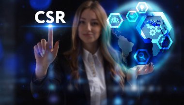 İş, Teknoloji, İnternet ve ağ konsepti. Genç işadamı geleceğin sanal ekranı üzerinde çalışıyor ve CSR yazısını görüyor.